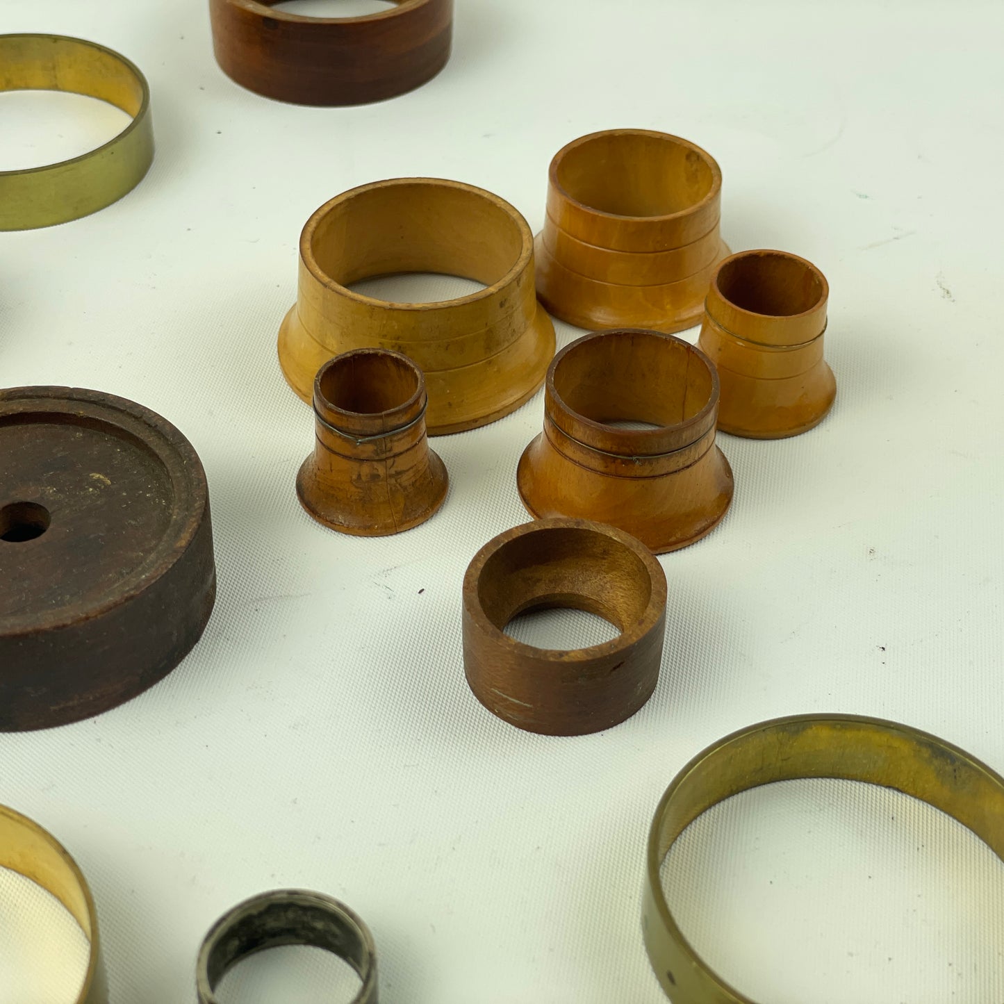 Apr Lot 38- Watchmaker’s Wood, Brass & Aluminum Lapel to Pocket Watch Movement Holders