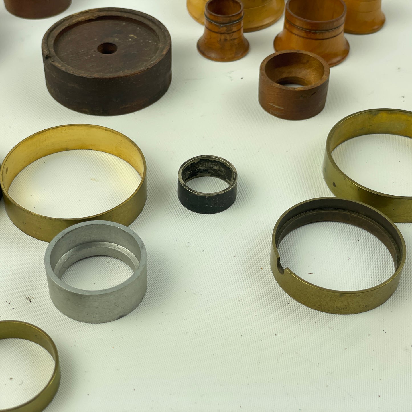 Apr Lot 38- Watchmaker’s Wood, Brass & Aluminum Lapel to Pocket Watch Movement Holders