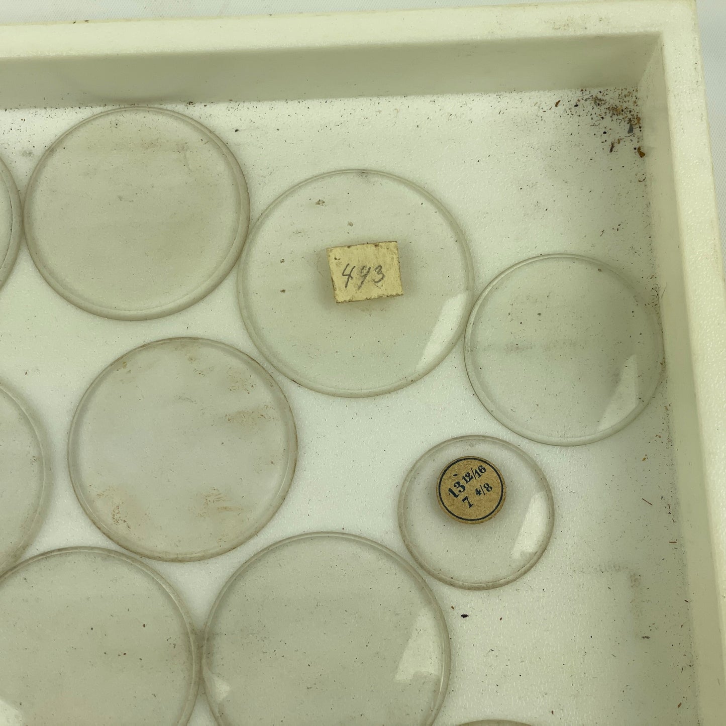 Apr Lot 75- Assortment of 25 Thick Beveled Labeled Pocket Watch Glass Crystals