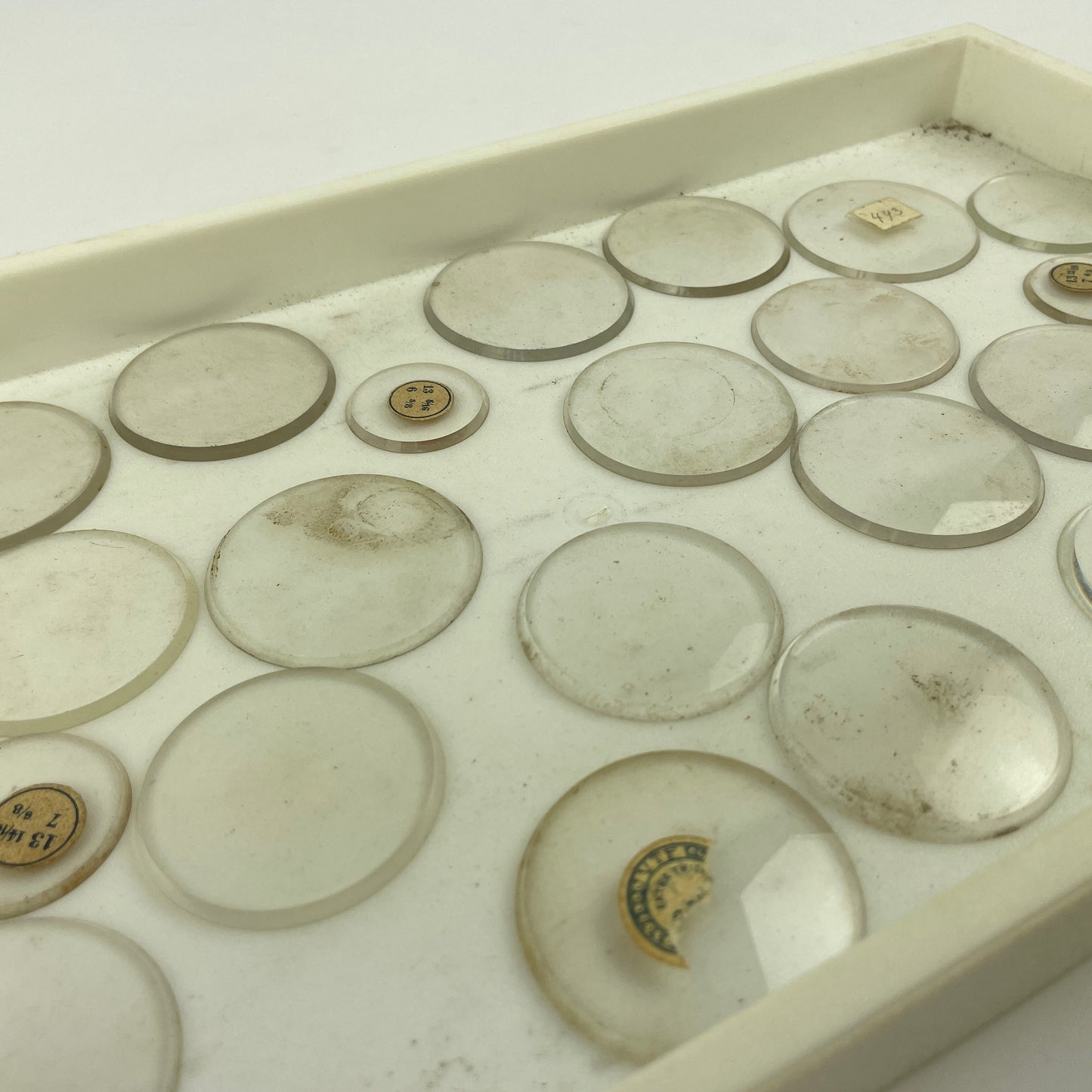 Apr Lot 75- Assortment of 25 Thick Beveled Labeled Pocket Watch Glass Crystals