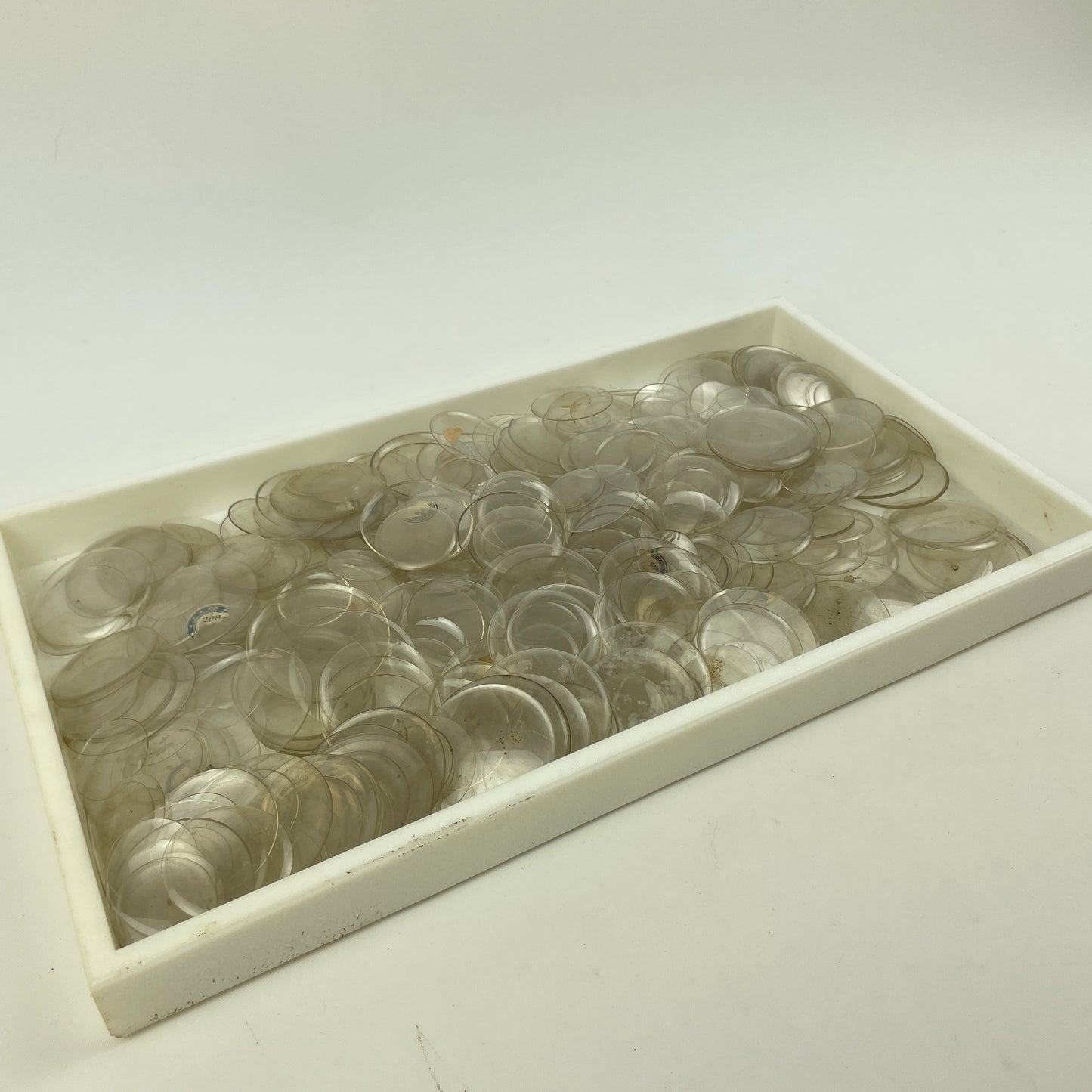 Apr Lot 29- Watchmaker’s Large Assortment of 500 Lapel & Pocket Watch Glass Crystals