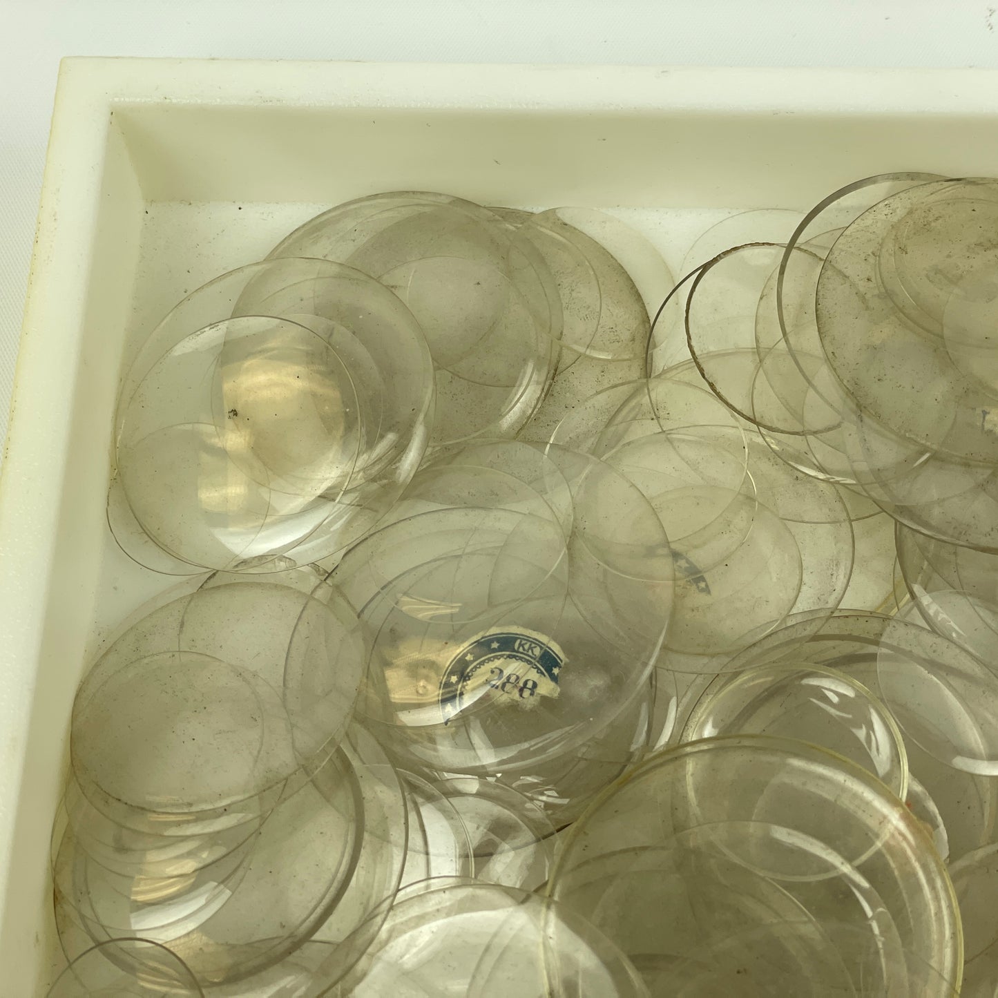 Apr Lot 29- Watchmaker’s Large Assortment of 500 Lapel & Pocket Watch Glass Crystals