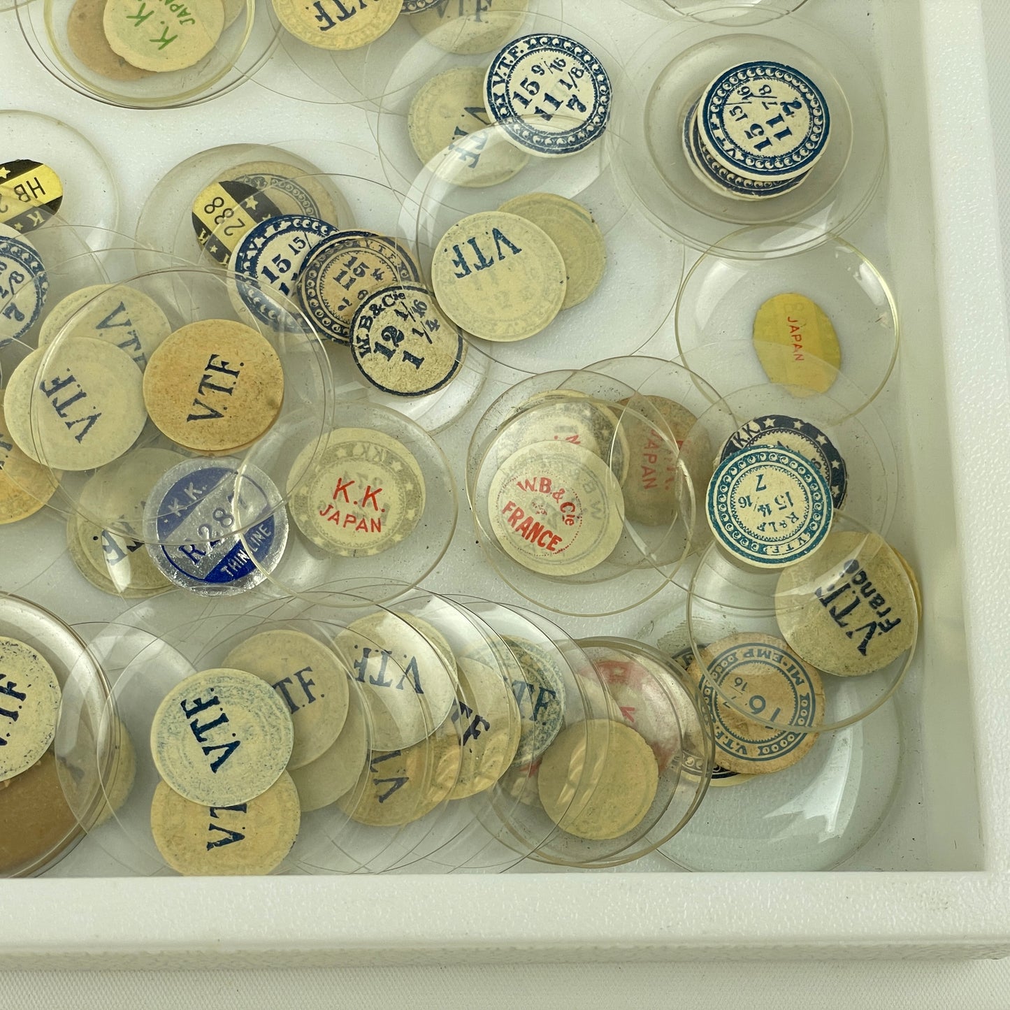 Apr Lot 109- Watchmaker’s & Collector’s Selection of 200 Glass NOS Pocket Watch Crystals