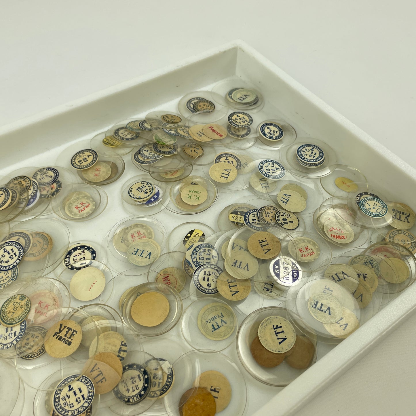 Apr Lot 109- Watchmaker’s & Collector’s Selection of 200 Glass NOS Pocket Watch Crystals