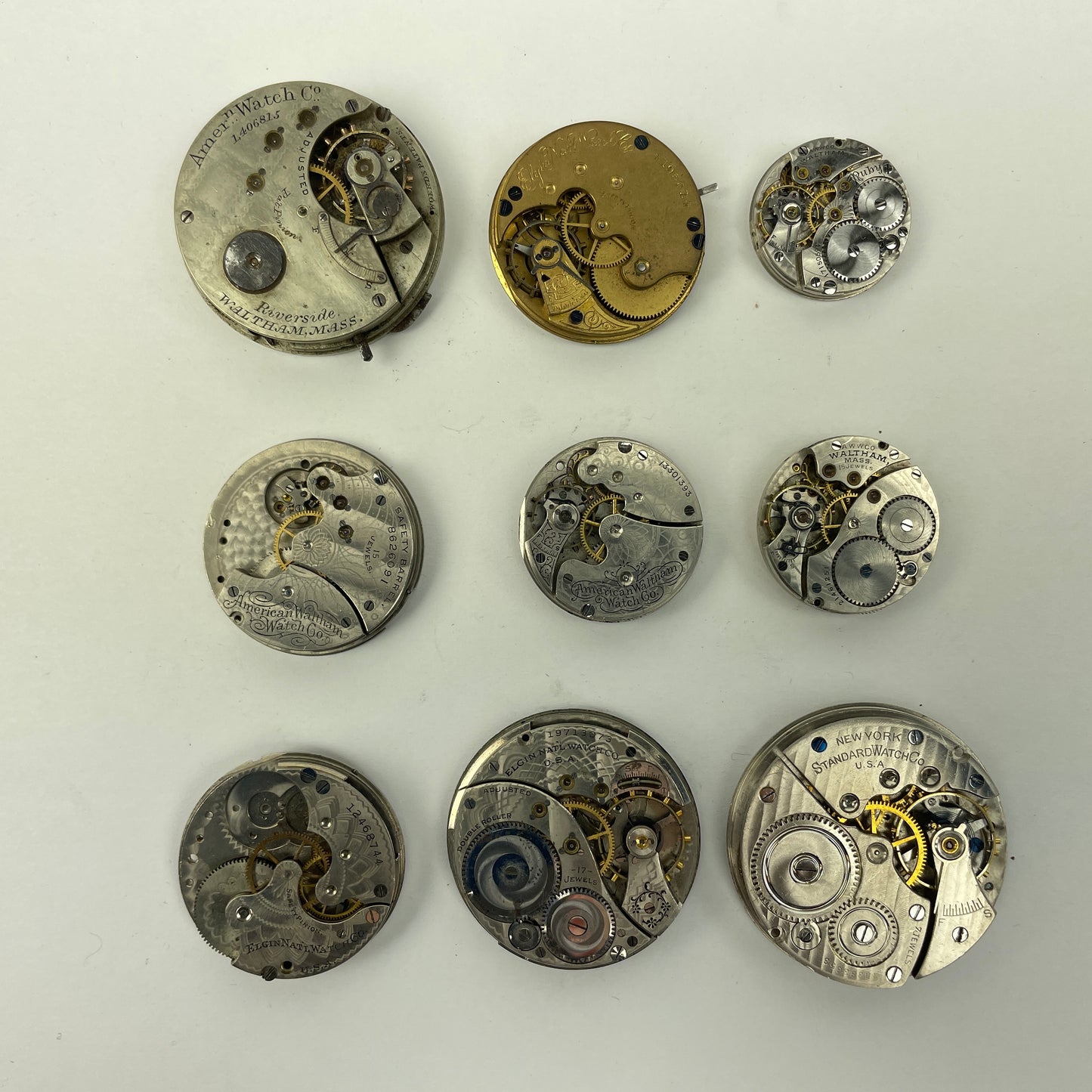 Lot 89- Elgin N. Y. Standard & Waltham 3/0, O 12, 14 & 16 Size Pocket Watch Movements