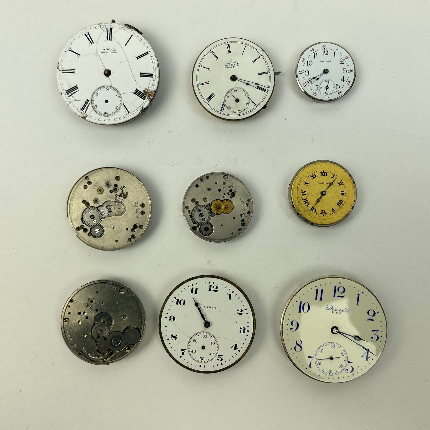 Lot 89- Elgin N. Y. Standard & Waltham 3/0, O 12, 14 & 16 Size Pocket Watch Movements