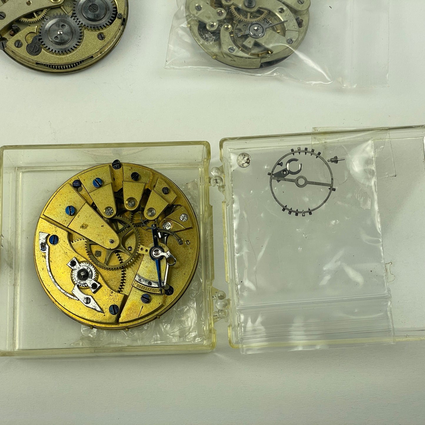 Lot 105- Watchmaker’s Selection of Swiss & English Pocket Watch Movements