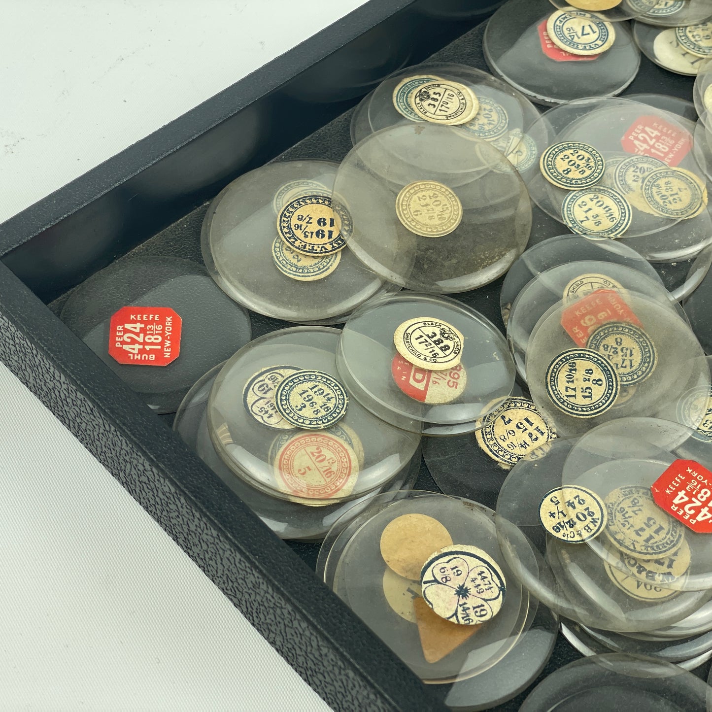 Lot 107- Watchmaker’s Selection of 200 Glass Pocket Watch Crystals