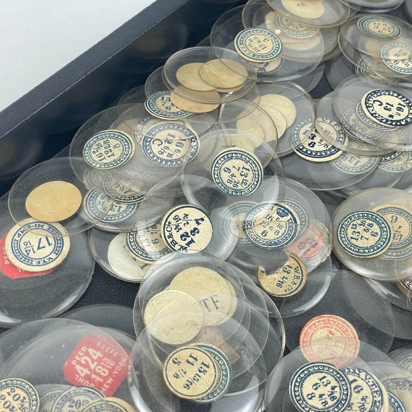 Lot 107- Watchmaker’s Selection of 200 Glass Pocket Watch Crystals