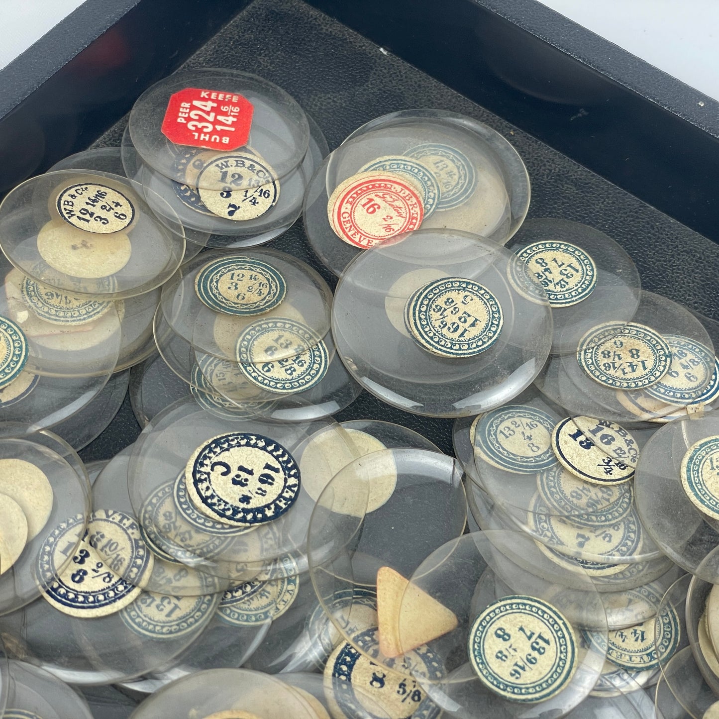 Lot 107- Watchmaker’s Selection of 200 Glass Pocket Watch Crystals
