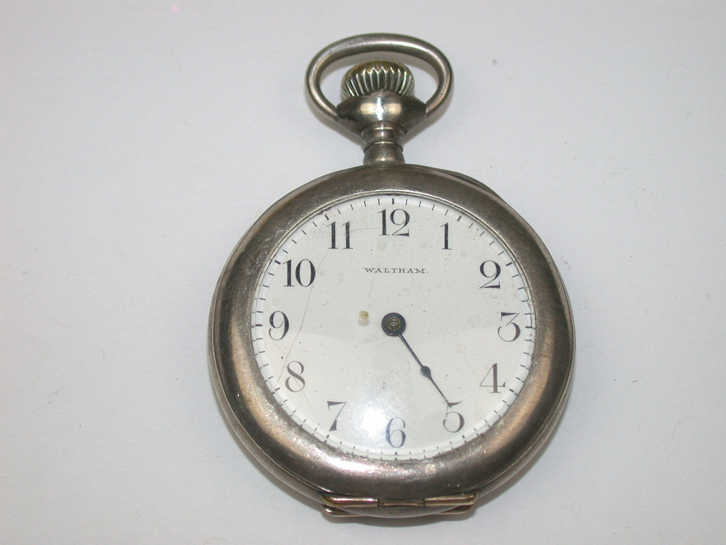 Lot 8- Three American & Swiss Silver & Metal Lapel or Ladies' Pocket Watches