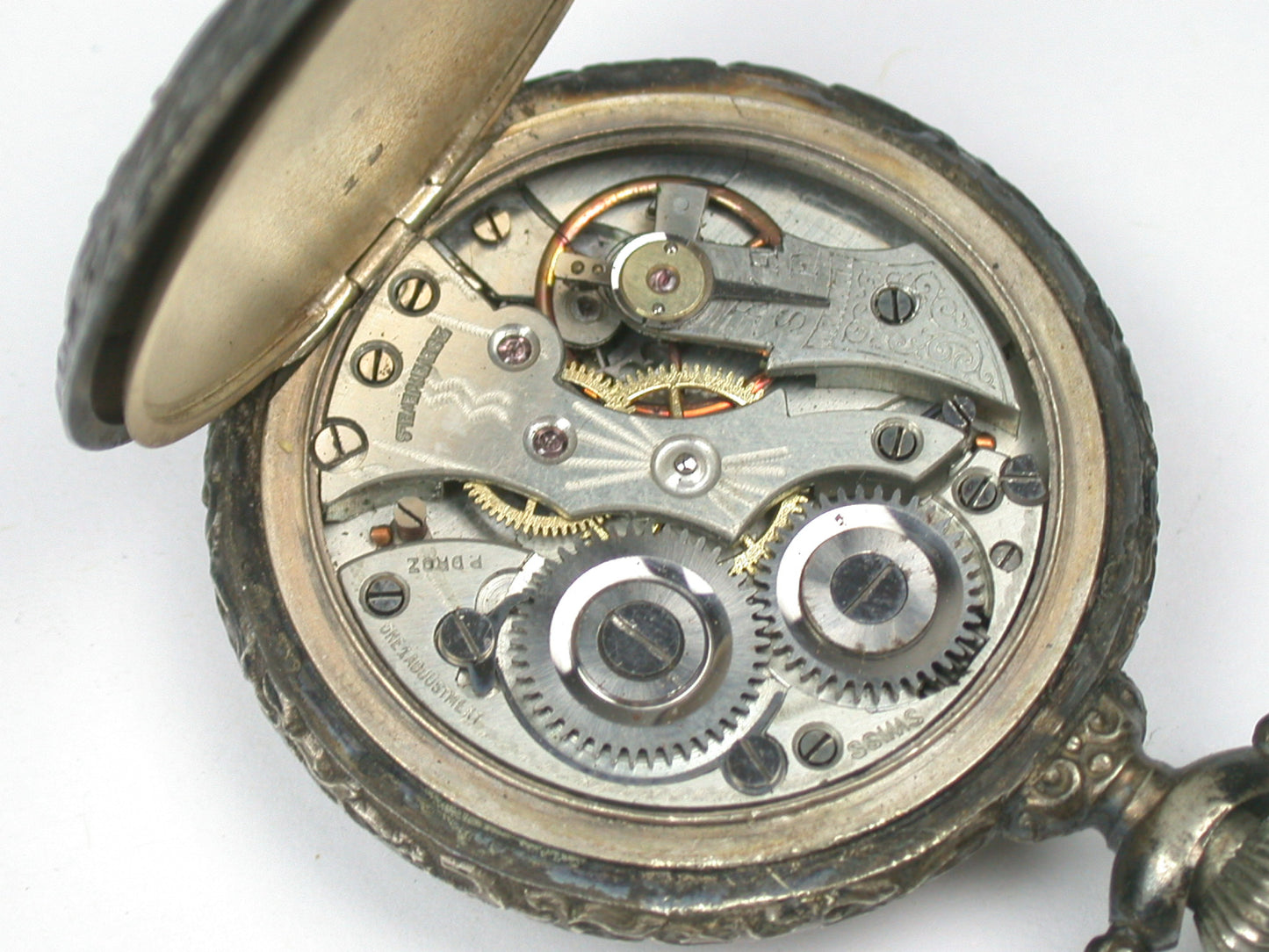 Lot 8- Three American & Swiss Silver & Metal Lapel or Ladies' Pocket Watches