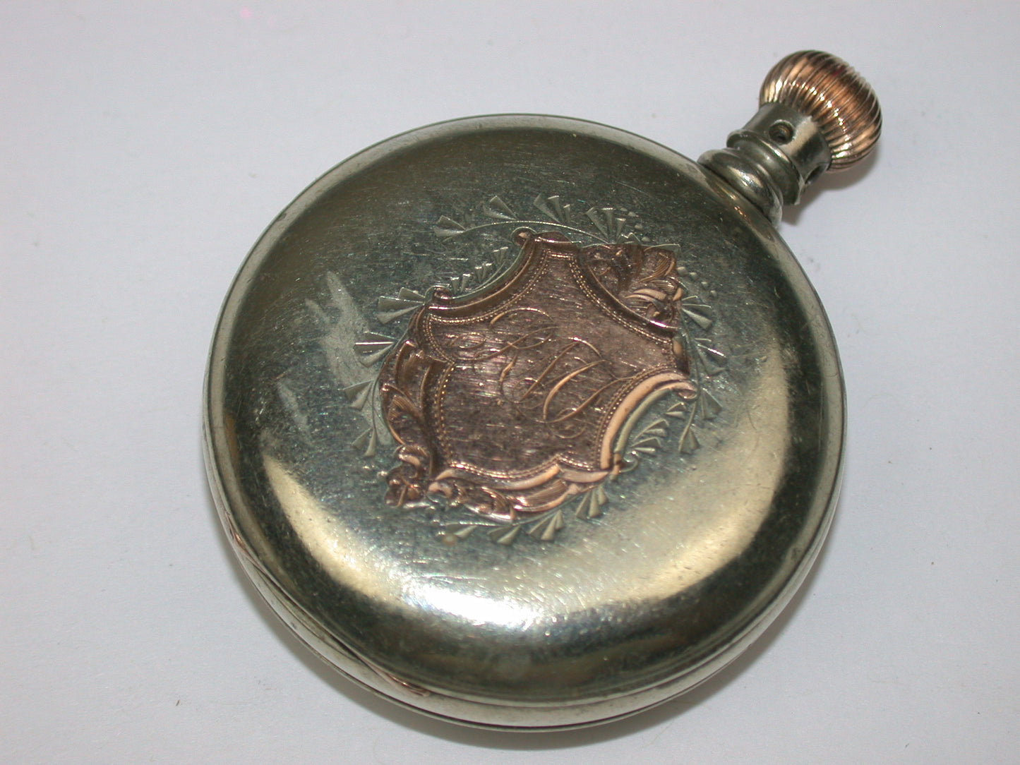 Lot 8- Three American & Swiss Silver & Metal Lapel or Ladies' Pocket Watches