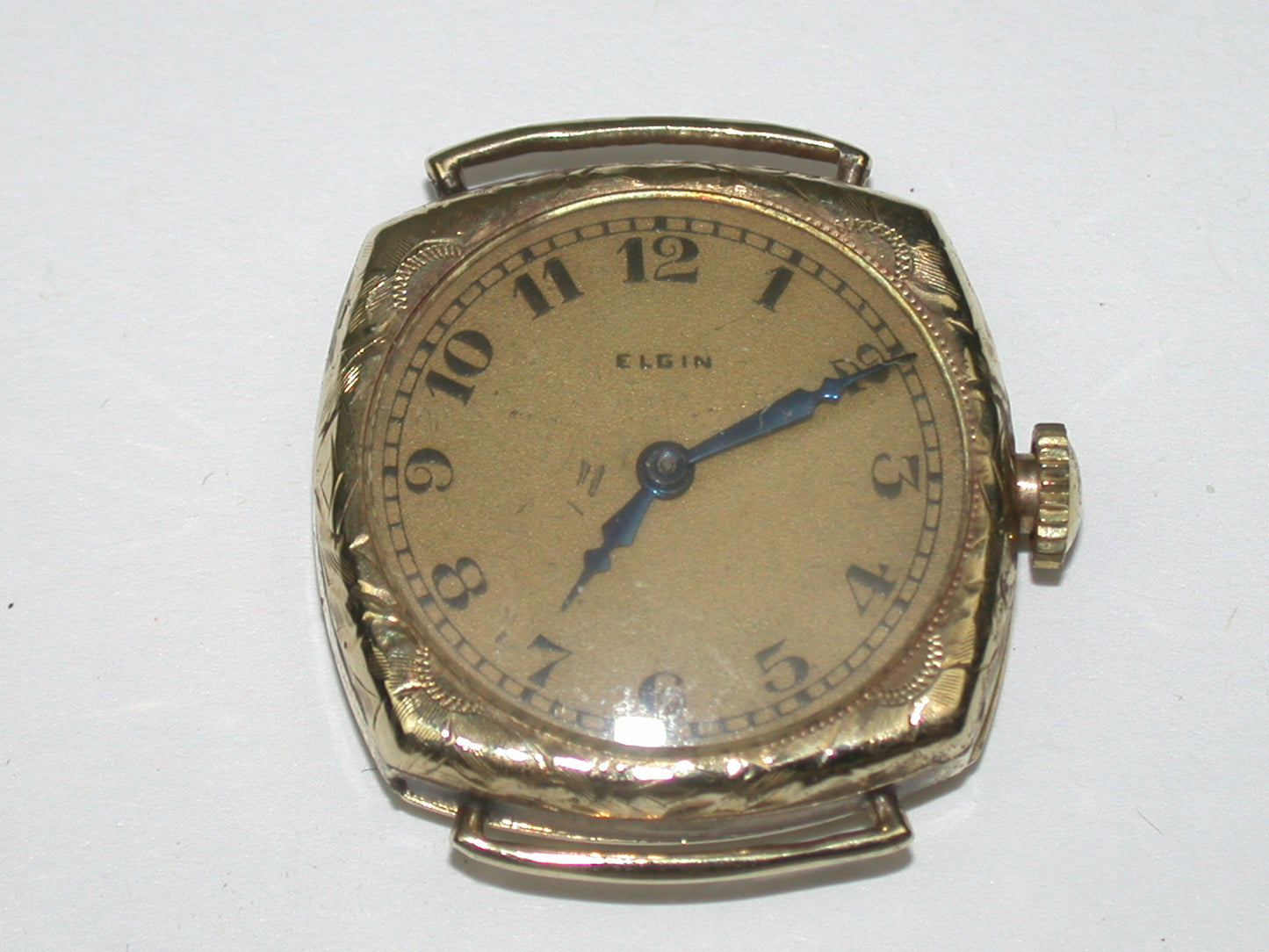Lot 6- Three Elgin Yellow Gold-Filled Lapel Watches & Wristwatch