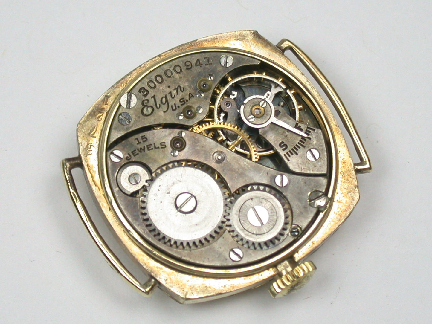 Lot 6- Three Elgin Yellow Gold-Filled Lapel Watches & Wristwatch