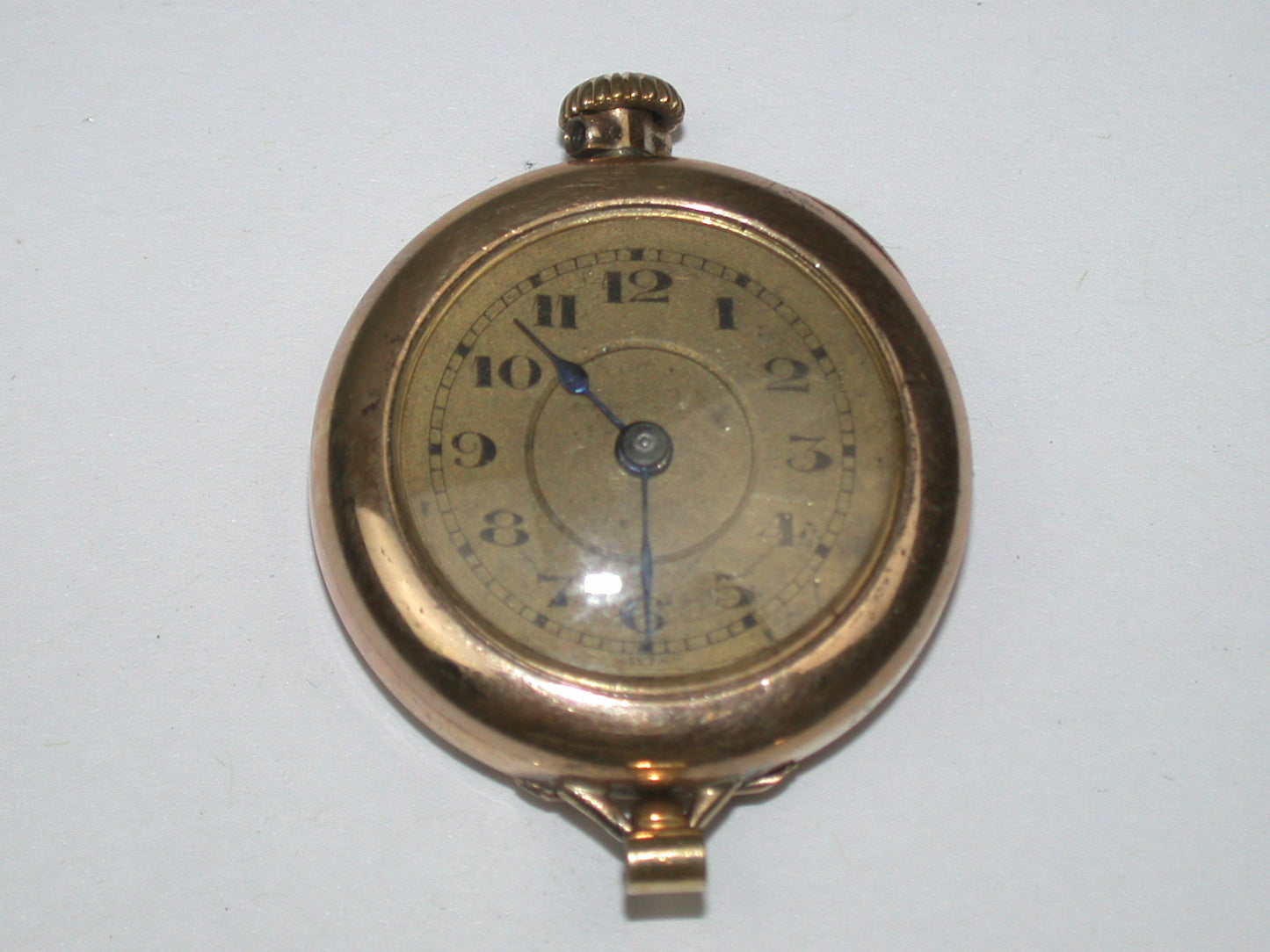 Lot 6- Three Elgin Yellow Gold-Filled Lapel Watches & Wristwatch