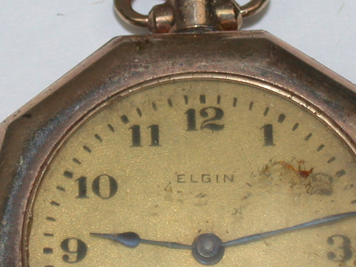 Lot 6- Three Elgin Yellow Gold-Filled Lapel Watches & Wristwatch