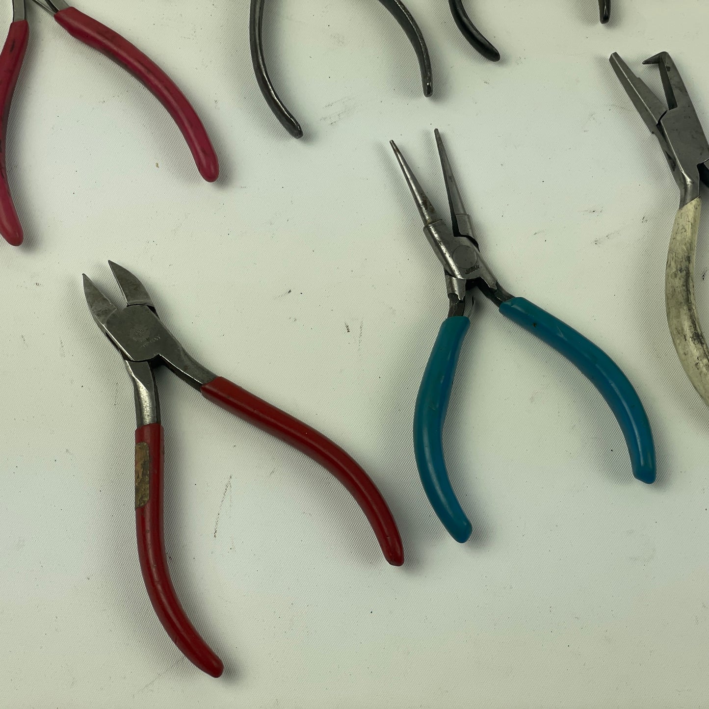 May Lot 60- Watchmaker’s Selection of Thirteen Pairs of Bench Pliers