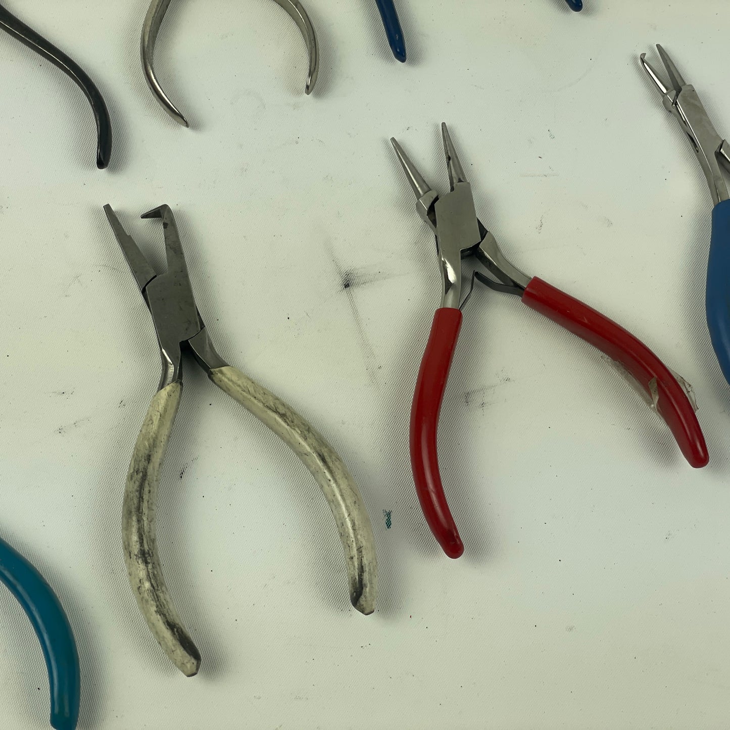 May Lot 60- Watchmaker’s Selection of Thirteen Pairs of Bench Pliers