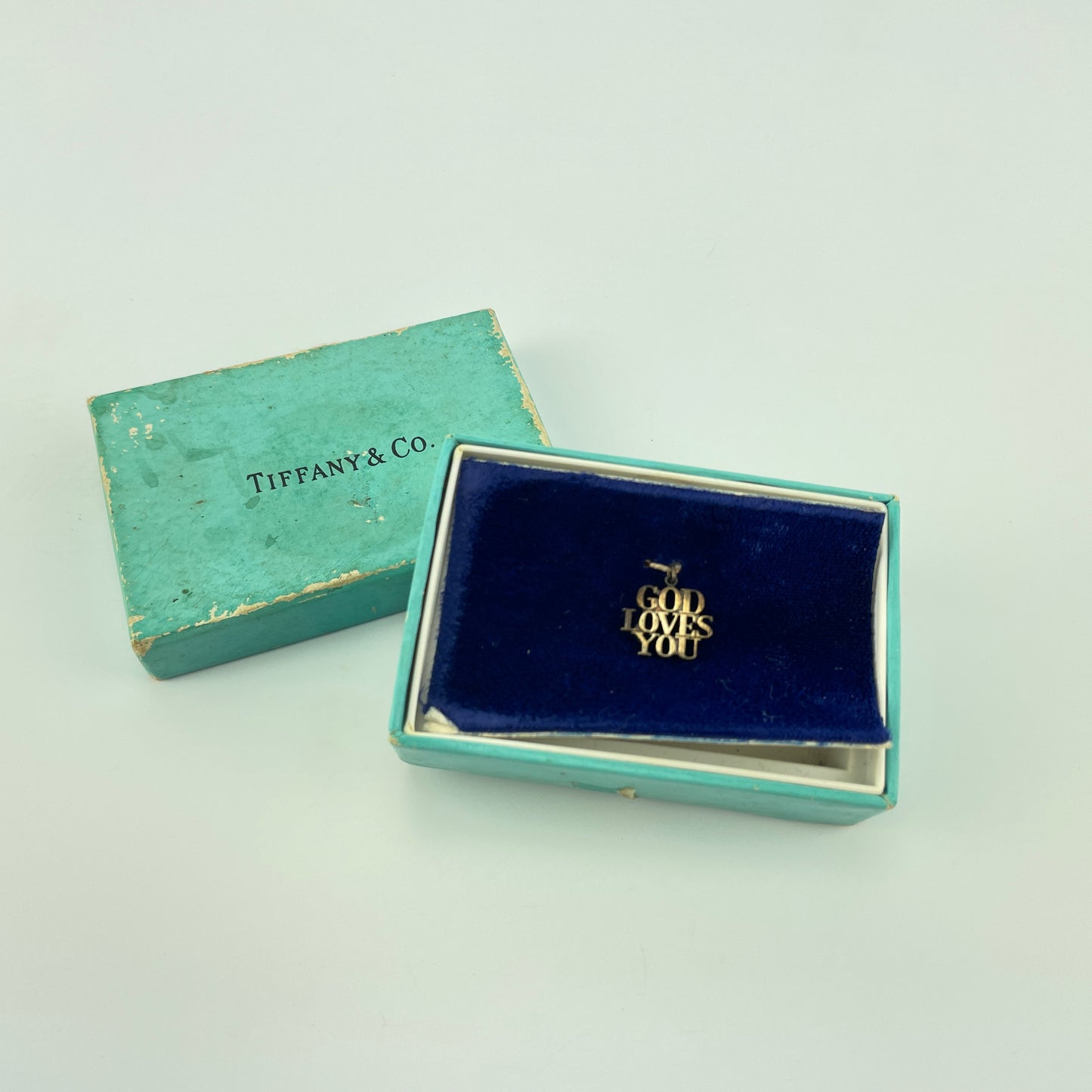Lot 57- Vintage Tiffany & Co. “God Loves You” Pendant