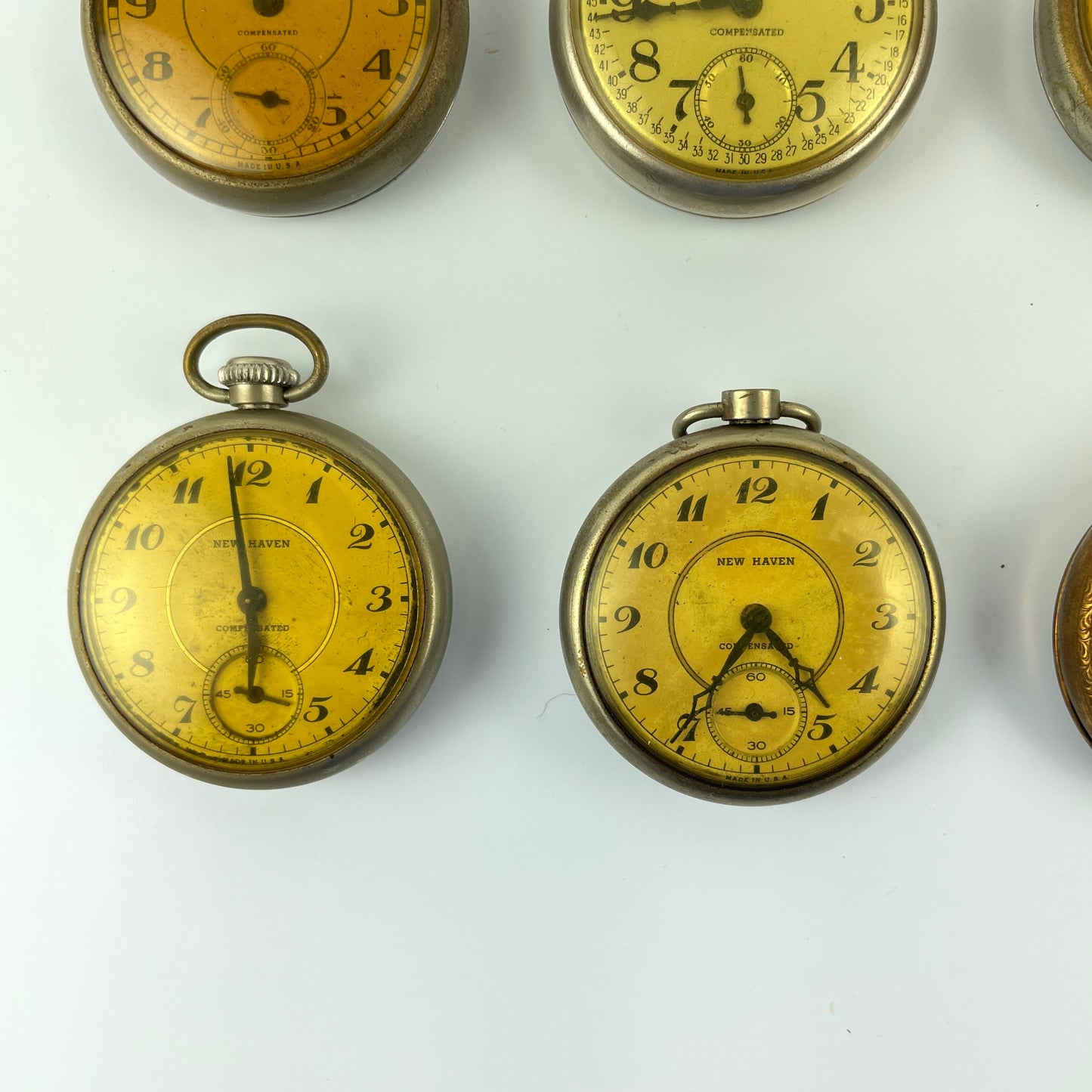 Lot 100- New Haven Dollar Pocket Watches