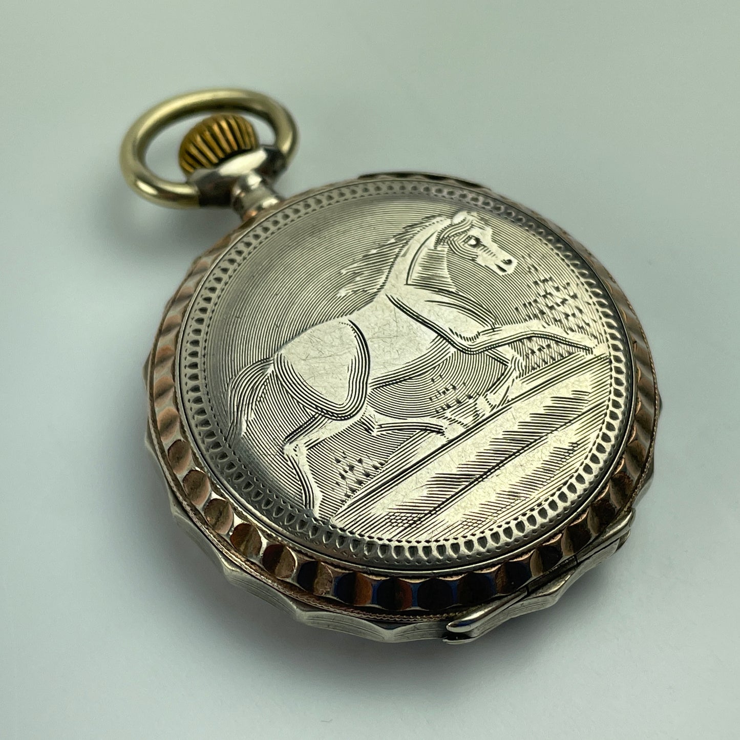 Lot 5- Swiss Coin Silver with Gold Bezel Pocket Watch