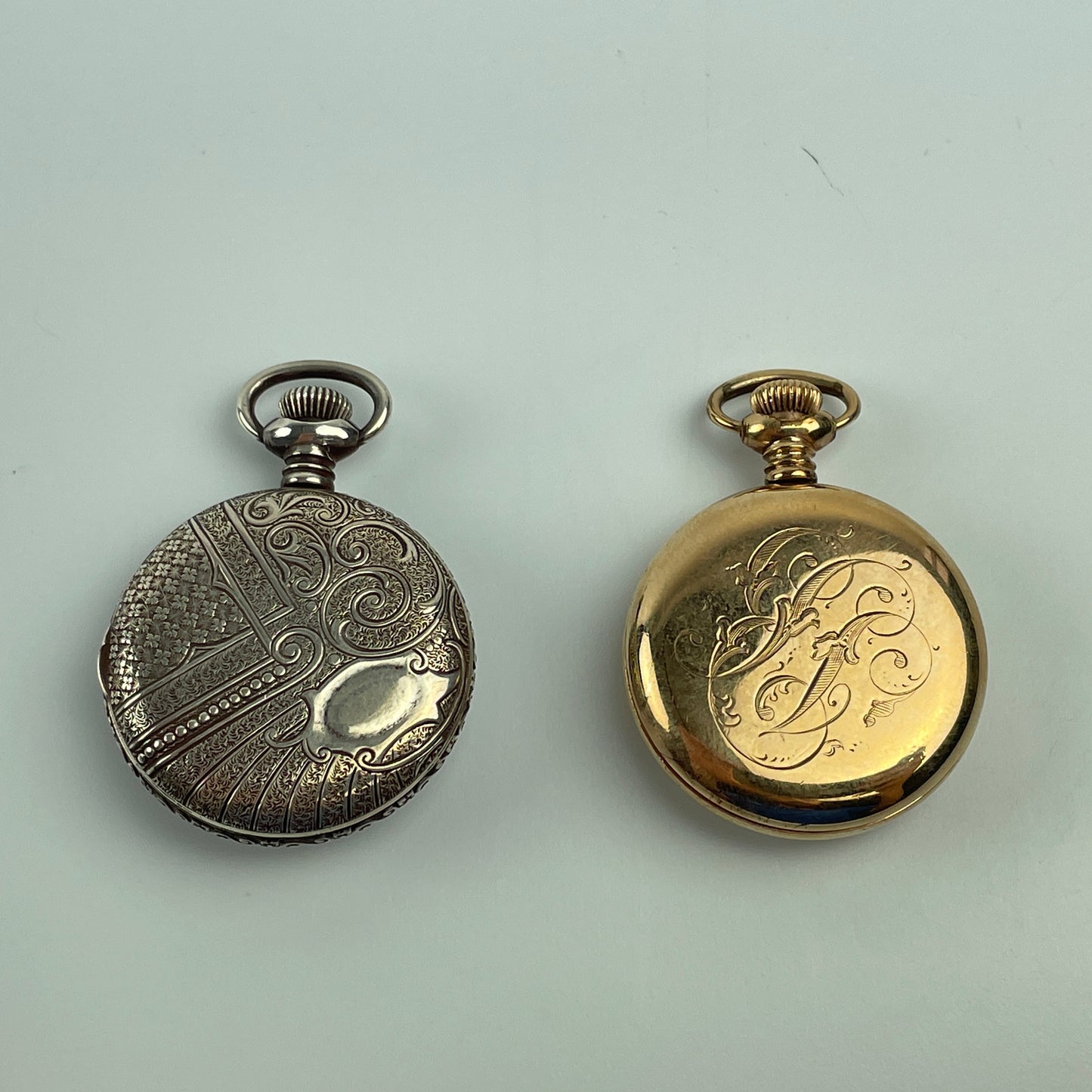 Lot 16- New England Watch Co. Ladies' Lapel Watches