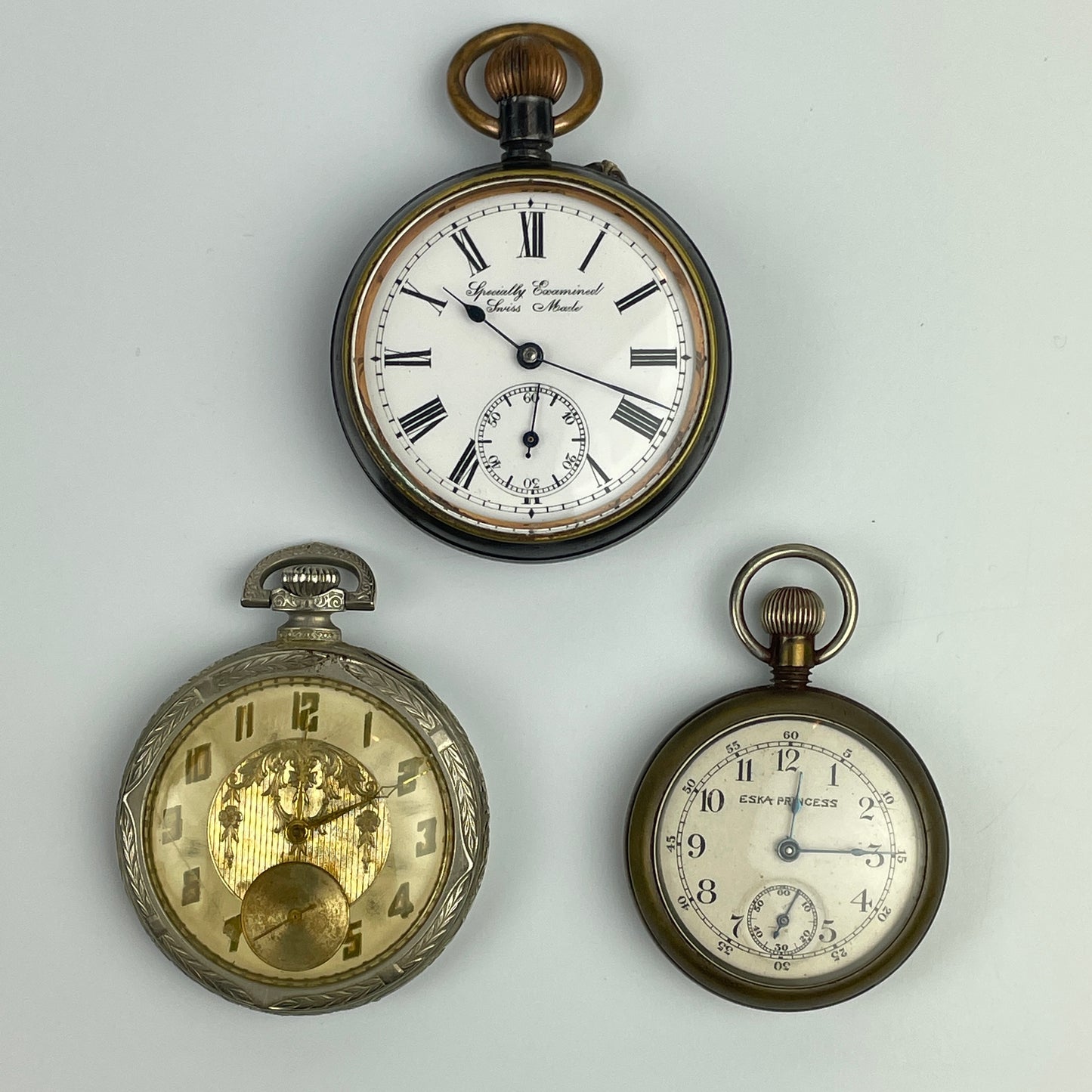 Lot 25- Three Swiss Non-Running Lapel & Pocket Watches