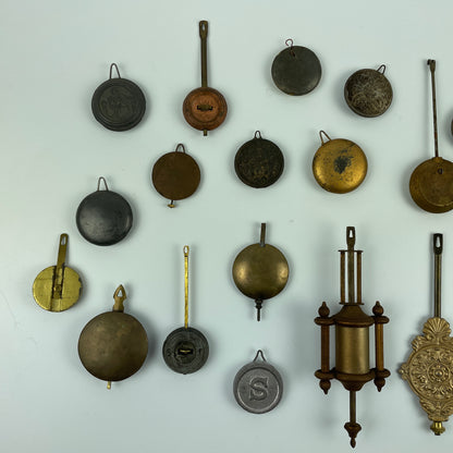 Lot 104- Clock Pendulum Assortment