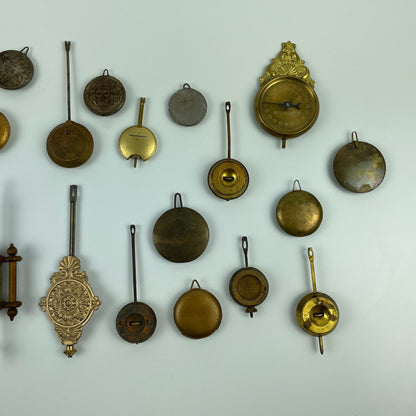 Lot 104- Clock Pendulum Assortment