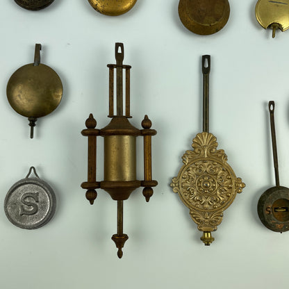 Lot 104- Clock Pendulum Assortment