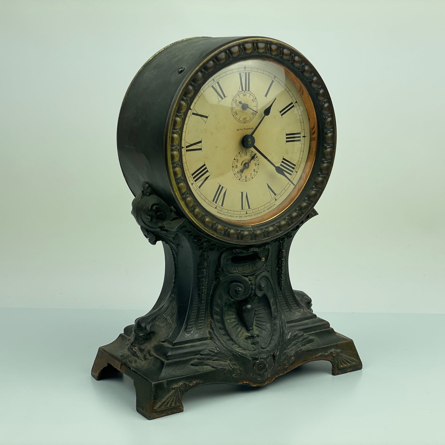 Lot 107- Seth Thomas Bronze Long Alarm Clocks