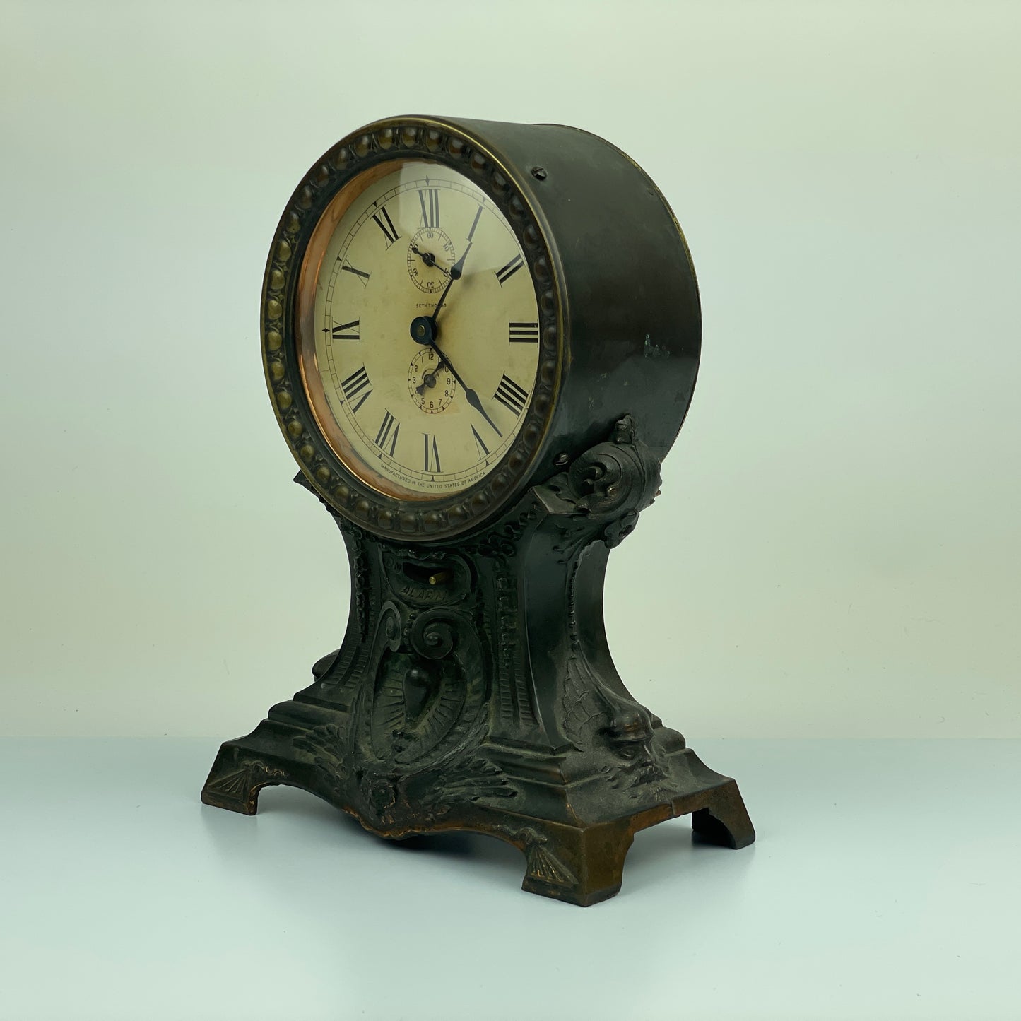 Lot 107- Seth Thomas Bronze Long Alarm Clocks