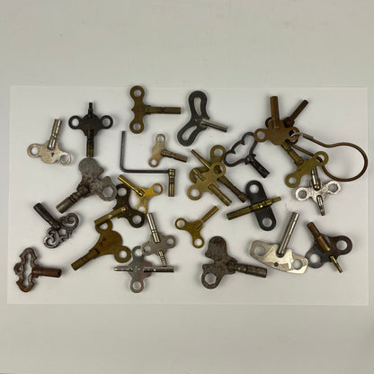 Lot 113- Clock Winding Keys (20)
