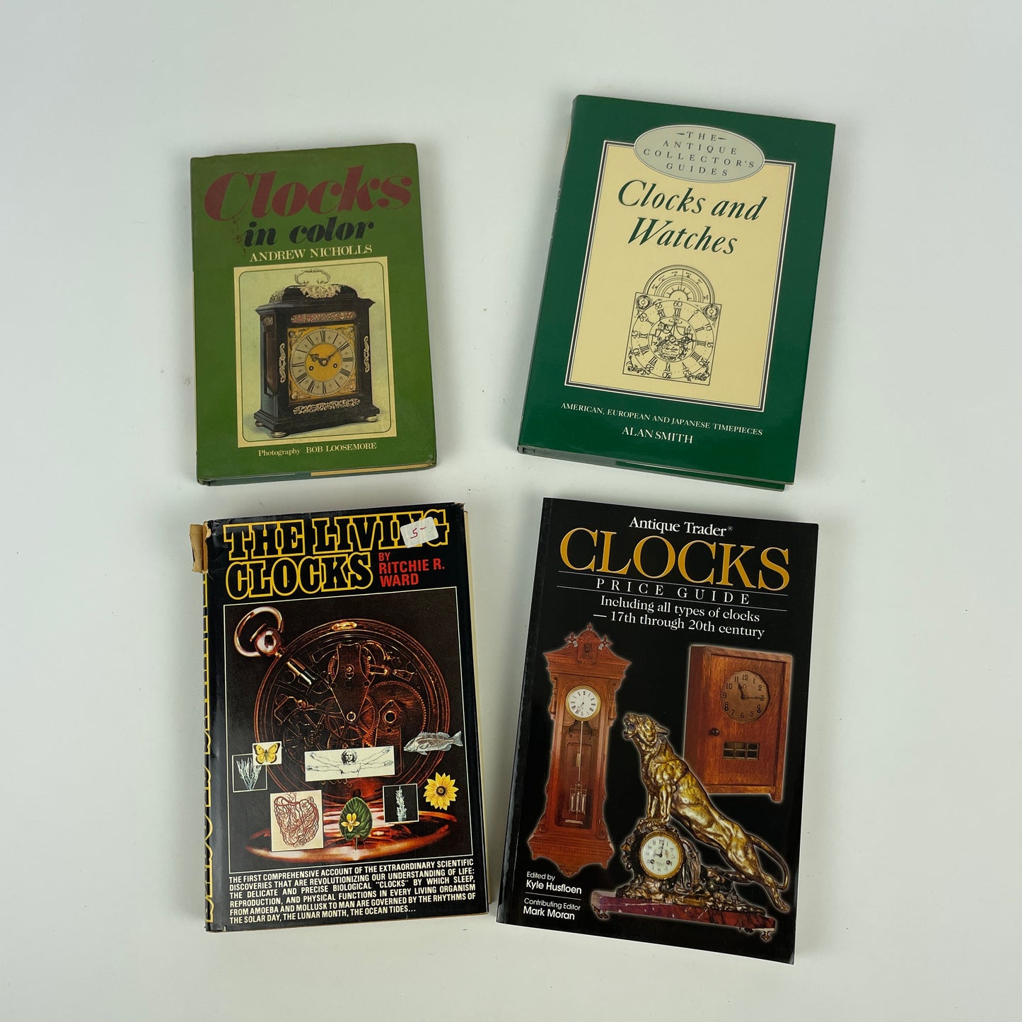Nov Lot 50- Clock Books set of (4)