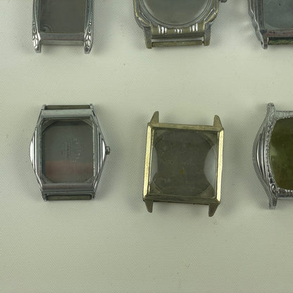 Jan Lot 63- Twelve Vintage Fancy Metal Wristwatch Cases