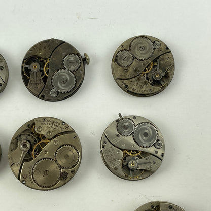 Lot 131-  Waltham & Elgin Lapel & Wristwatch Movements