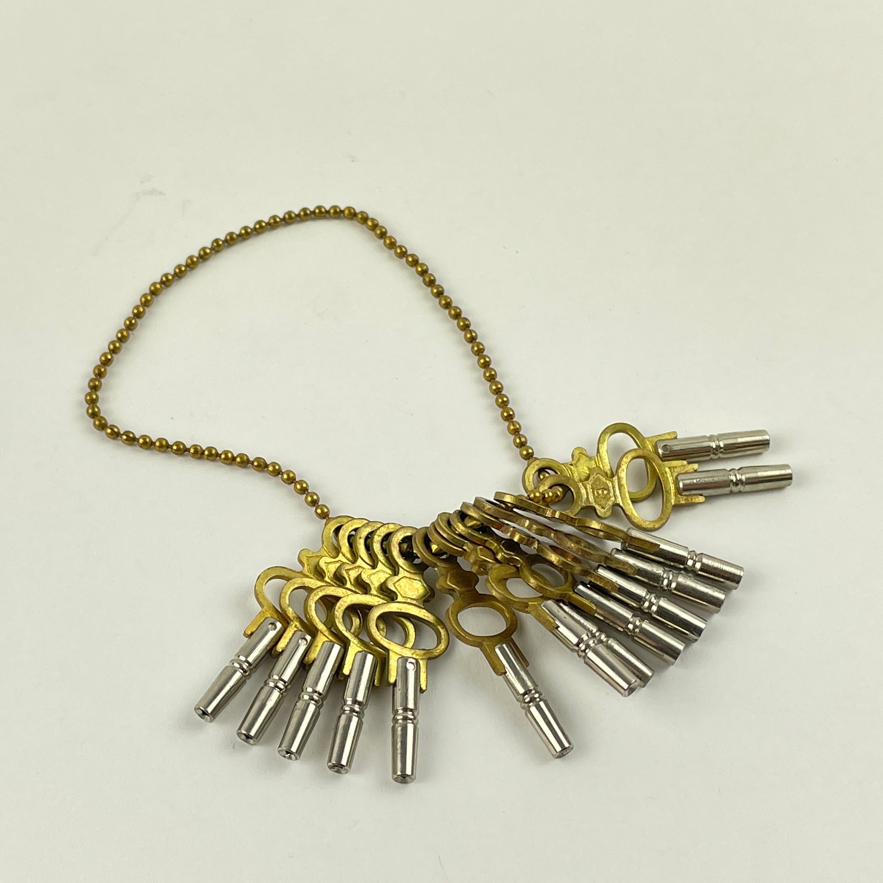 Feb Lot 115- Swiss Modern Pocket Watch Keys Set of (14) – watchpartsrus