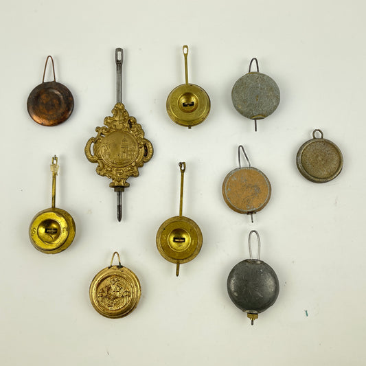 Feb Lot 121- Vintage Antique Clock Pendulum Bobs