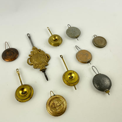 Feb Lot 121- Vintage Antique Clock Pendulum Bobs
