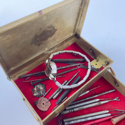 Lot 79- Bifold Case with Watchmakers Tools