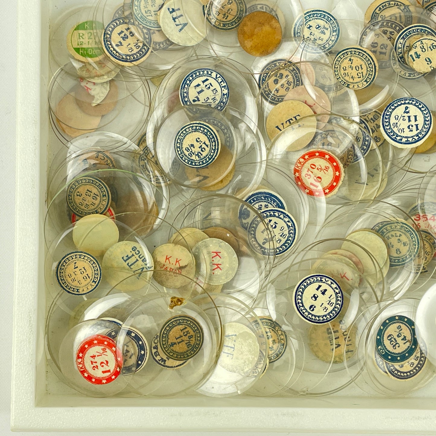Lot 108- Watchmaker’s Selection of 300 Glass NOS Pocket Watch Crystals