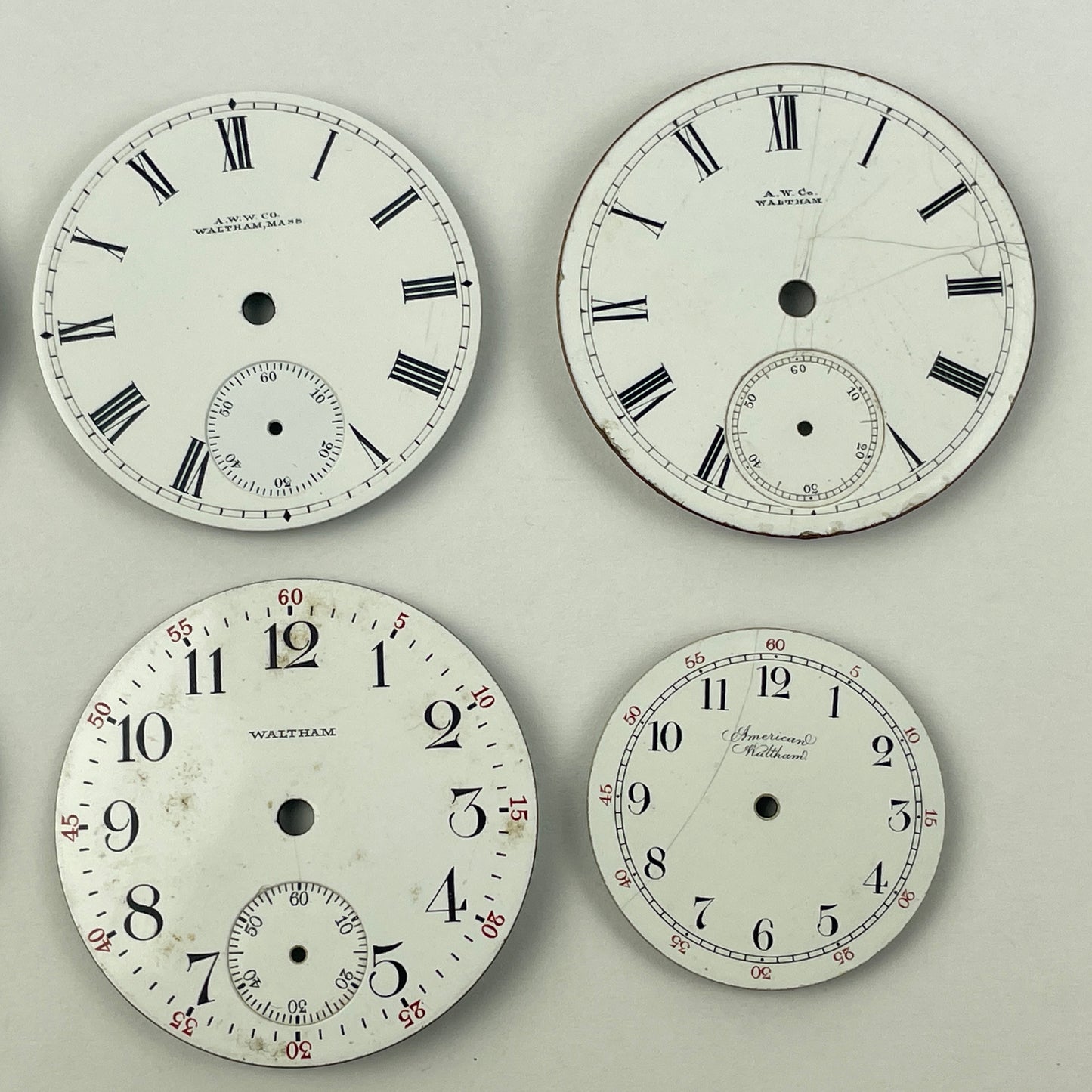 Apr Lot 26- Waltham Assortment of 12 Enamel Pocket Watch Dials