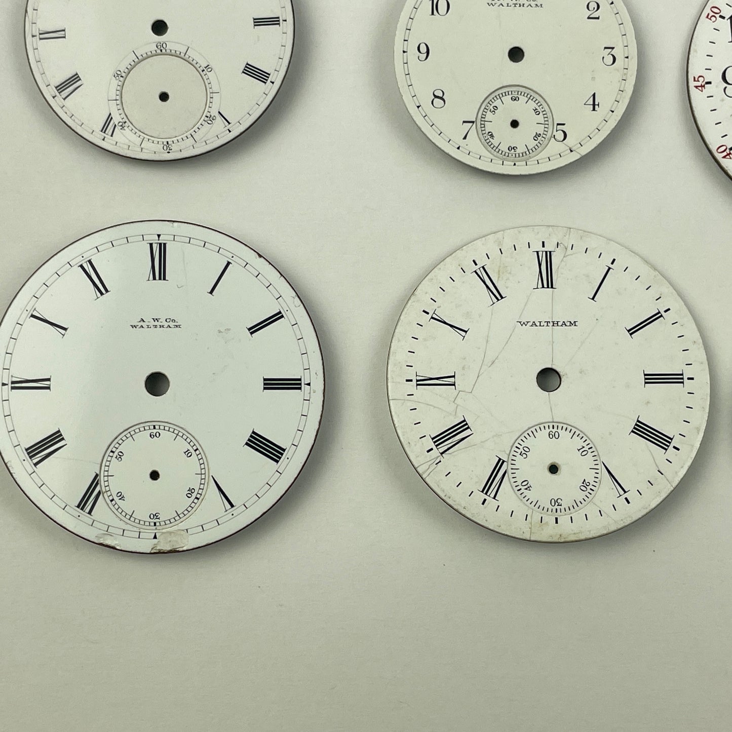 Apr Lot 26- Waltham Assortment of 12 Enamel Pocket Watch Dials