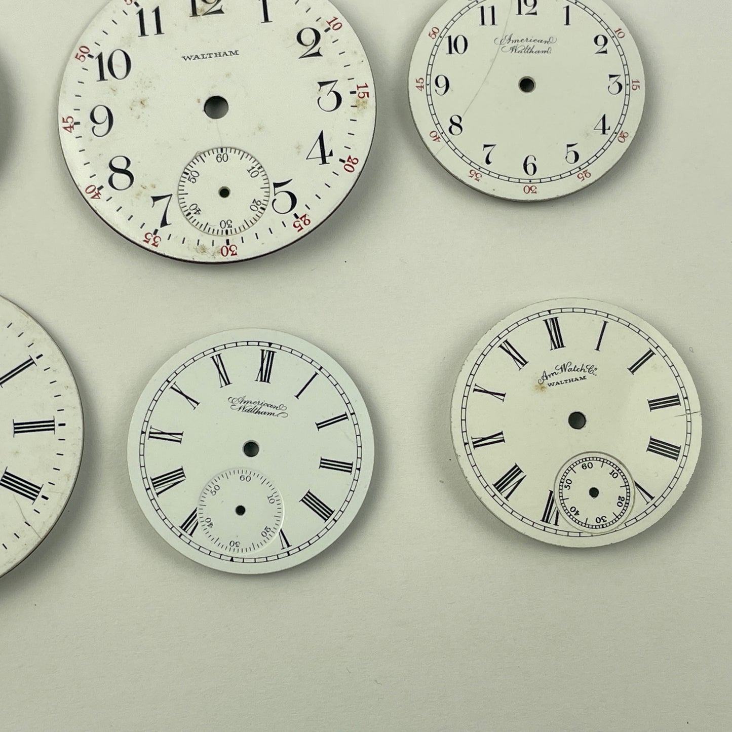 Apr Lot 26- Waltham Assortment of 12 Enamel Pocket Watch Dials