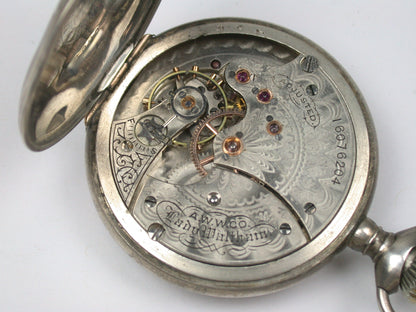 Lot 8- Three American & Swiss Silver & Metal Lapel or Ladies' Pocket Watches