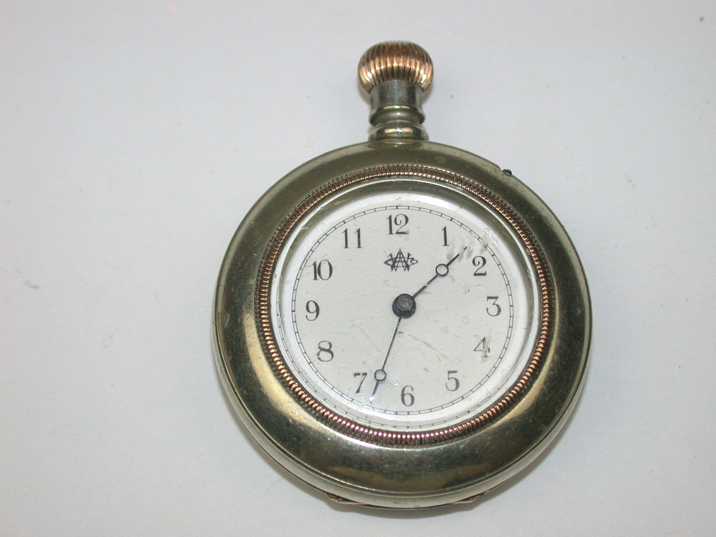 Lot 8- Three American & Swiss Silver & Metal Lapel or Ladies' Pocket Watches