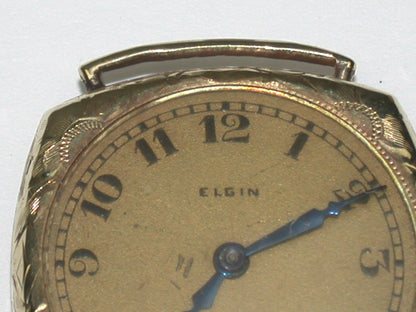 Lot 6- Three Elgin Yellow Gold-Filled Lapel Watches & Wristwatch
